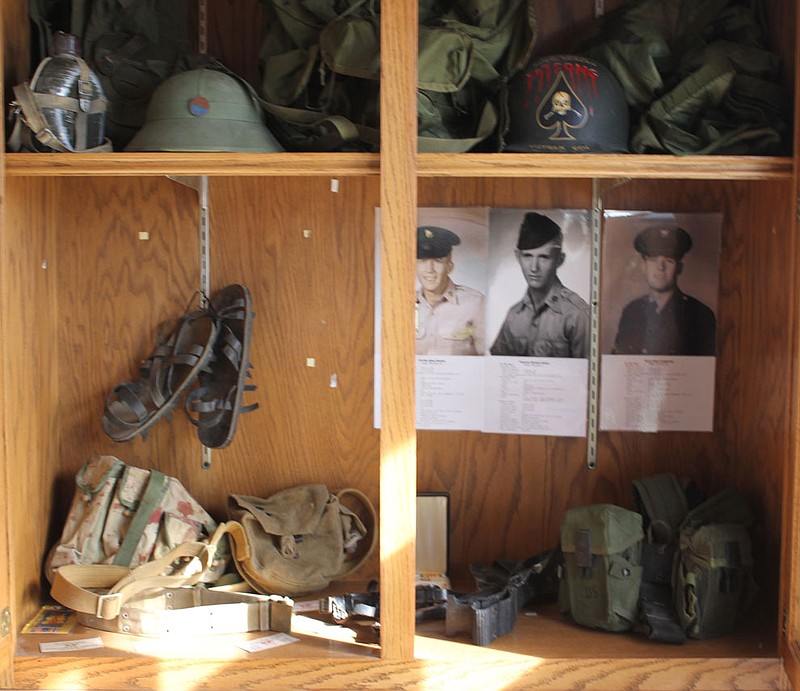 This display of both American and Viet Cong military memorabilia greets visitors to the Fulton VFW Post on Collier Lane. VFW leadership seek younger veterans of Desert Storm, Iraq and Afghanistan to bolster the group's ranks and ensure that it stays active as its World War II, Korean and Vietnam War veterans age.