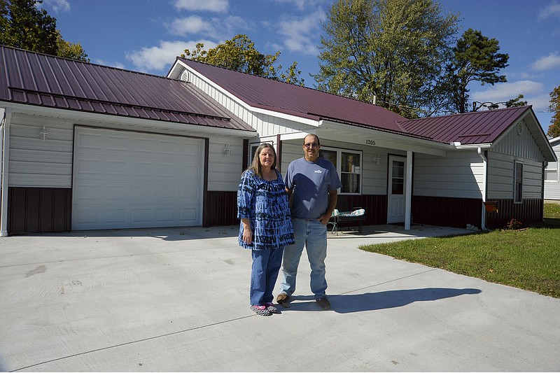 Don and Brenda Cram have built their dream home in the form of a "shouse" in the 1200 block of Birdsong, which has captured the curiousity of neighbors and passers-by since they moved in in July. Democrat photo/Michelle Brooks