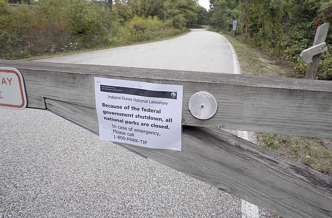 In this Tuesday, Oct. 1 2013 photo, the West Beach Indiana Dunes National Lakeshore park in Chesterton, Ind. is closed as a result of the federal government shut down. (AP Photo/The Times, John Luke)

