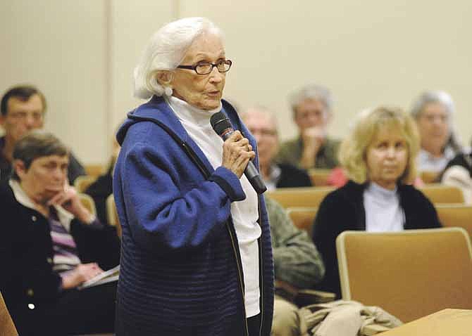 Barbara Hellwege speaks to Ward 1 and Ward 2 councilmen as she gives her thoughts on the state of the JeffTran system during a combined community meeting at Jefferson City Hall on Saturday.
