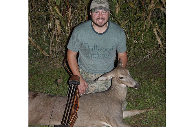 Brandon Butler, above, points out that a big doe like this one should be enough to host a good size wild game feast.