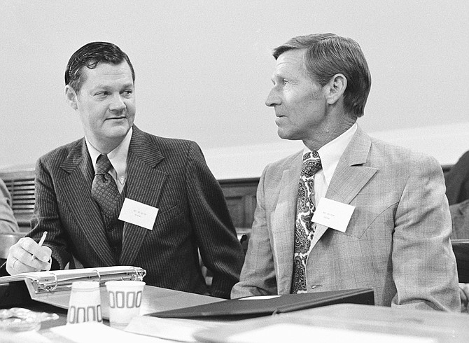 In this Dec. 3, 1976, photo, then newly elected members of the House of Representatives Ike Skelton, D-Mo., left, and Bob Stump, D-Ariz., attend an orientation meeting on Capitol Hill in Washington. 