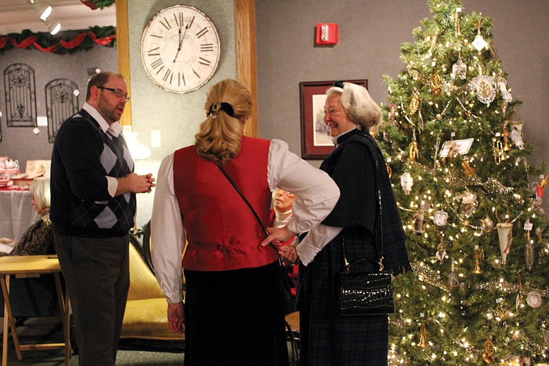 In this file photo from last year, Jody Paschal (left) chats with patrons at the National Churchill Museum's annual Victorian Christmas. The 30th annual event will be held Nov. 14.