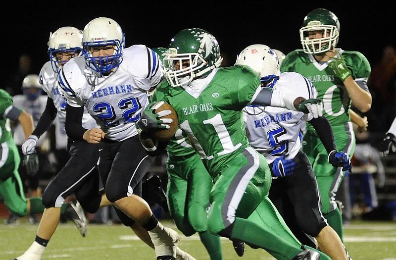 Blair Oaks running back Dominic Jamerson picks up some yardage Wednesday night in Wardsville.