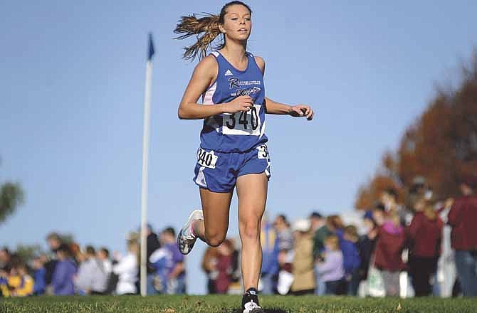 Miranda Hill of Russellville runs on her way to capturing the state cross country title in the Missouri Class 1 girls event Saturday at the Oak Hills Golf Center in Jefferson City.