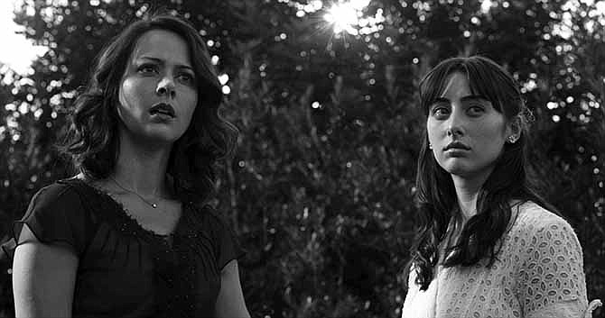 This film image released by Roadside Attractions shows Amy Acker, left, and Jillian Morgesen in a scene from "Much Ado About Nothing." As an iconoclastic group, modern black-and-white movies stand out for their classical photography and their willful connection to an earlier period of filmmaking. 