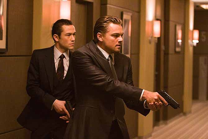 In this film publicity image released by Warner Bros., Joseph Gordon Levitt, left, and Leonardo DiCaprio are shown in a scene from "Inception." 
