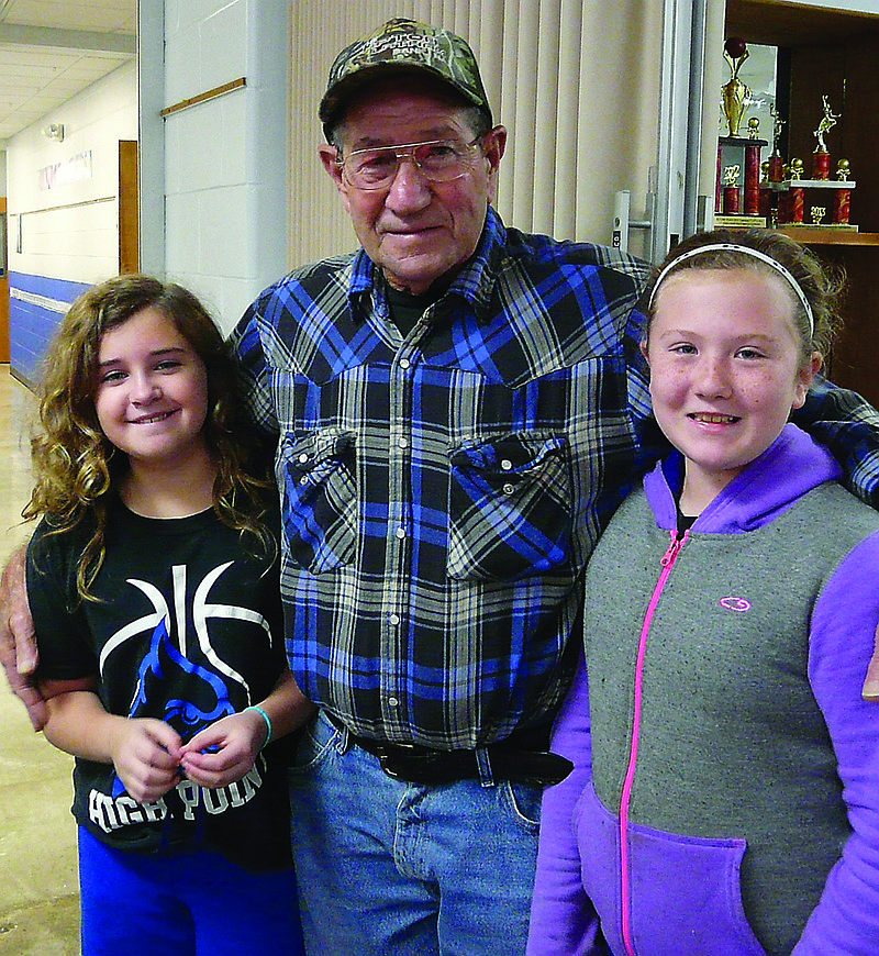 Veteran Fred Blankenship, center, enjoyed attending the Veterans breakfast at High Point R-III with his nieces Felicity Blankenship, left, and Mackenzie Blankenship right.