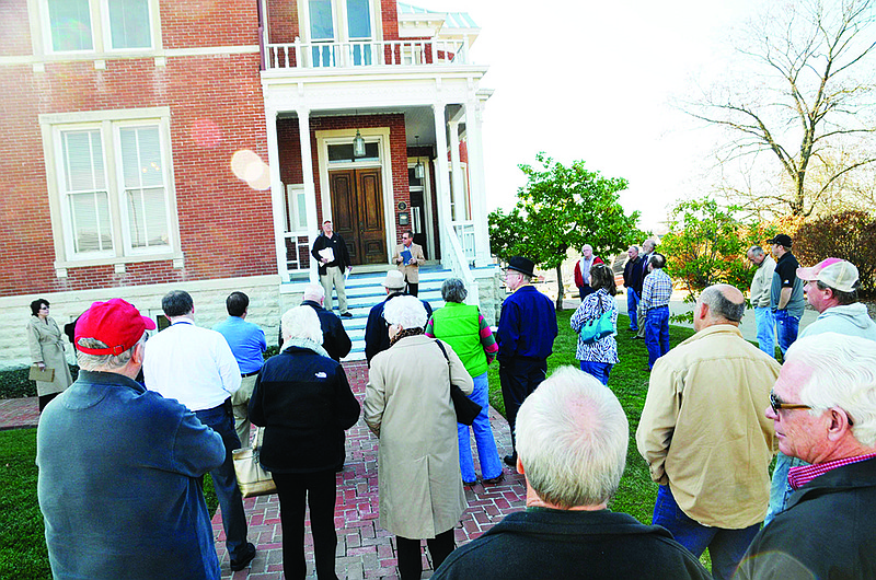 Both the seriously interested and curious buyers were in attendance Friday at the noon auction of the Marmaduke House on the corner of East Capitol Avenue and Lafayette Street. The bidding stalled at $300,000 and Jeff Schaepherkoetter was able to purchase the historic home for that amount.