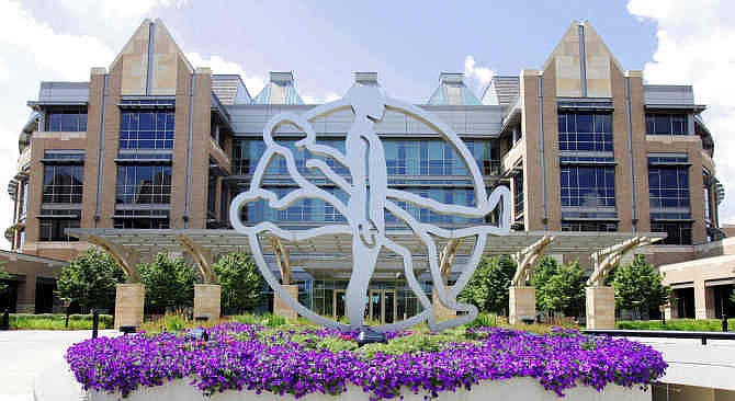  In this Aug. 17, 2005 file photo, The "Rising Man" symbol stands in front of the Fridley, Minn., based Medtronic. Medtronic announced Friday, Nov. 15, 2013, that the Food and Drug Administration recall of 15,000 recalled guidewires had been classified as Class I, a category reserved for products with reasonable potential to cause serious injury or death. 
