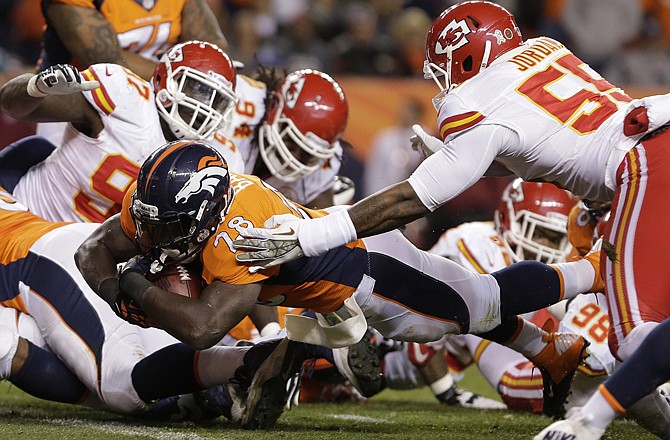 Montee Ball of the Broncos leaps across the goal line for a touchdown in Sunday's game against the Chiefs in Denver.