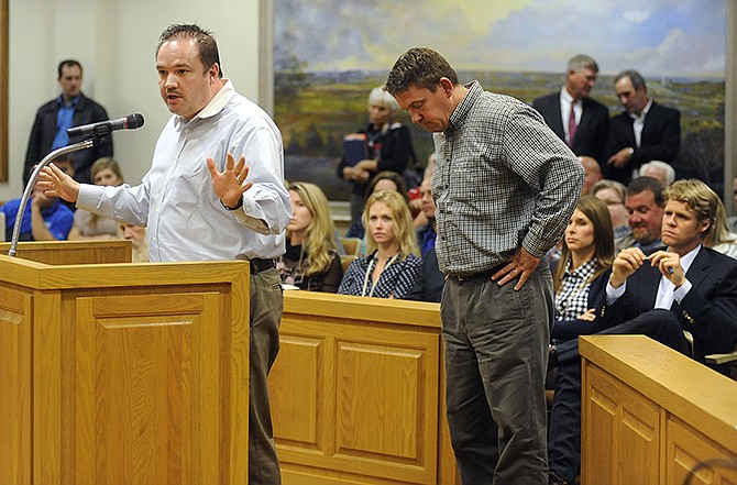 Trey Propes, left, and Scott Ehrhardt, right, address members of the City Council while speaking on behalf of Ehrhardt Hospitality Group's conference center proposal during Monday night's meeting and vote at City Hall. Seated at front right is Kirk Farmer of the other developer, Farmer Holding Company.