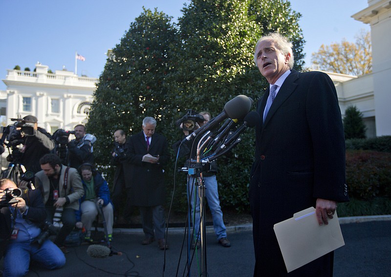 Sen. Bob Corker, R-Tenn., ranking Republican on the Senate Foreign Relations Committee, speaks to members of the media Tuesday outside the West Wing of the White House in Washington, following a meeting with President Barack Obama. The President met with chairmen, ranking members, as well as other members of the Senate Banking Committee, Senate Foreign Relations Committee, Senate Armed Services Committees, and Senate Select Committee on Intelligence regarding Iran.