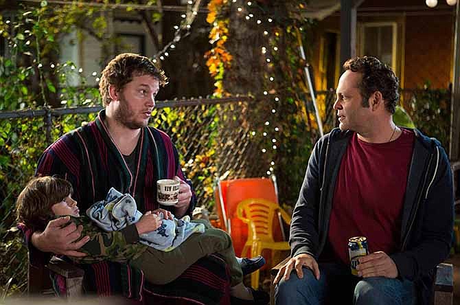 This image released by Disney DreamWorks II Distribution Co. shows Chris Pratt, left, and Vince Vaughn in a scene from "Delivery Man".