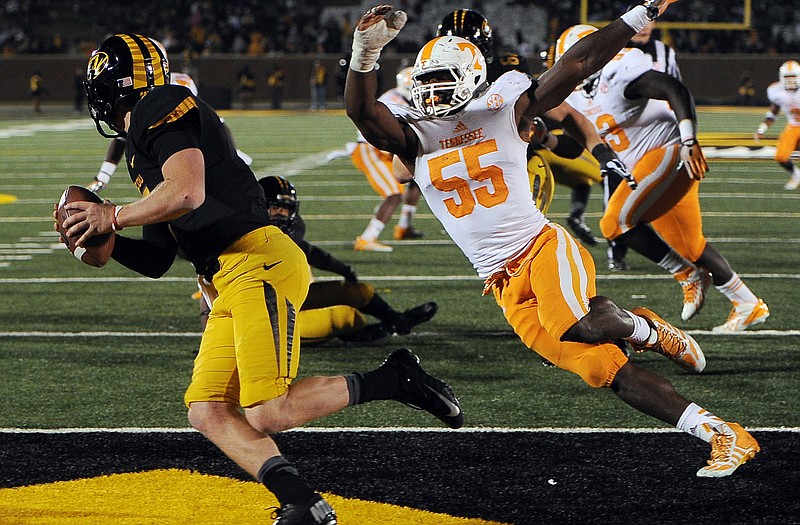 Missouri quarterback Maty Mauk, shown scrambling away from Tennessee defensive lineman Jacques Smith during a game earlier this month in Columbia, will head back to the sidelines as starter James Franklin returns to the lineup this Saturday.