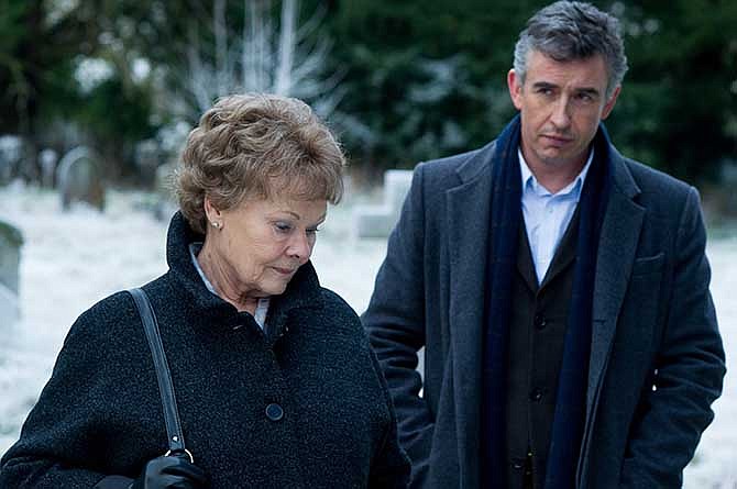 This image released by The Weinstein Company shows Judi Dench, left, and Steve Coogan in a scene from "Philomena." The British comic and Oscar-winning actress co-star in the film opening Friday, Nov. 22, 2013, which explores the benefits and costs of faith through the true story of Philomena Lee.