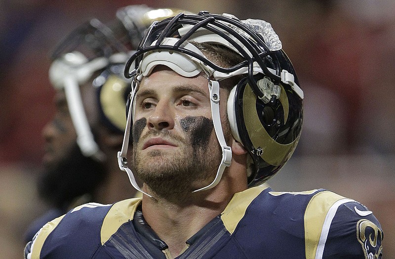 Rams defensive end Chris Long (91) will go head to head with his brother, Bears offensive lineman Kyle Long, on Sunday in St. Louis.