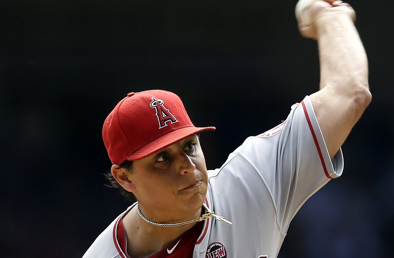Jason Vargas, who signed with the Royals on Thursday, delivers a pitch while playing for the Angels last season.