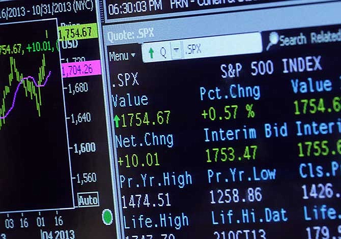 A screen on the floor of the New York Stock Exchange, Tuesday, Oct. 22, 2013, shows the closing number for the Standard & Poor's 500n Index. 