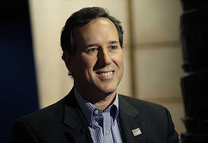 This Nov. 18, 2013 photo shows former Pennsylvania Senator and Republican presidential hopeful Rick Santorum during an interview at a movie theater in New York. In June, he became CEO of EchoLight Studios, a Dallas-based Christian film company that produces and distributes what it calls faith-based family films. 