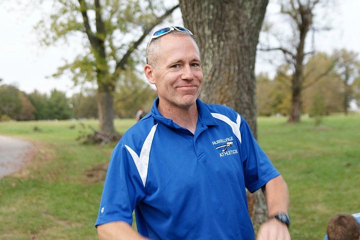 Craig Miller serves as coach of the Russellville High School cross country team.
