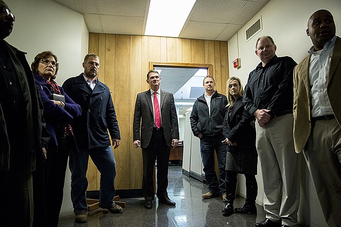 Cole County Presiding Commissioner Marc Ellinger, center, and representatives from the Community Health Center of Central Missouri and Lincoln University meet to discuss plans for a renovation to the Thompkins Health Center on the Lincoln University campus. 