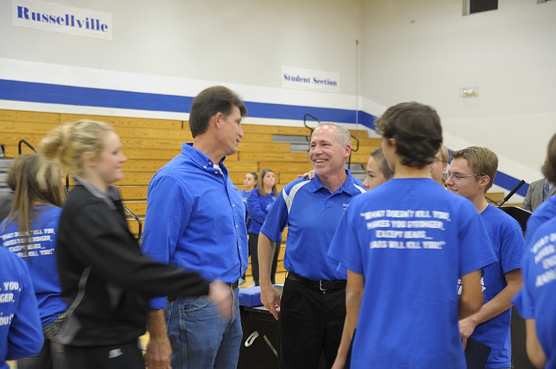 Coach Craig Miller was congratulated following a Community Pep Rally recently held in Russellville for the Girls and Boys Cross Country Teams, which took first place in their division at the state competition. Democrat photo/Michelle Brooks