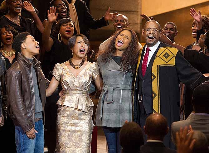 This image released by Fox Searchlight Films shows, from left, Jacob Latimore, Angela Bassett, Jennifer Hudson and Forest Whitaker in a scene from "Black Nativity."