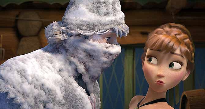 This image released by Disney shows Kristoff, voiced by Jonathan Groff, left, and Anna, voiced by Kristen Bell, in a scene from the animated feature "Frozen." 