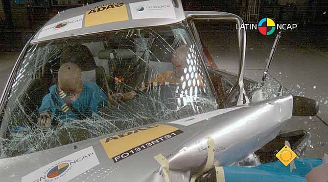 In this image taken from a March 2013 video released by independent crash-test group Latin NCAP on Nov. 27, 2013, a Nissan model Tsuru vehicle with no airbags is crash-tested at Latin NCAP's facilities in Landsberg am Lech, Germany. Many international car manufacturers with plants in Mexico produce two versions of cars; sending models with air bags, antilock brakes and electronic stability control to the United States, and cars without those safety features to the local market. 