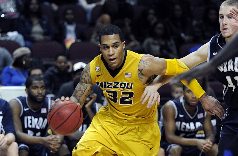Missouri's Jabari Brown drives to the basket against Nevada during the first half Friday at the Las Vegas Invitational.
