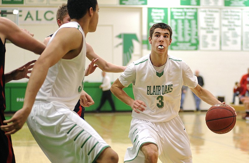 Logan Bax of Blair Oaks prepares to drive to the basket during a game last season in Wardsville.