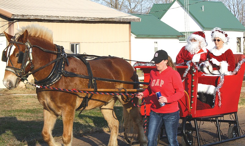 Santa and Mrs. Claus make an appearance at the 2011 Auxvasse Christmas Parade. This year's parade starts at 3 p.m. Sunday.