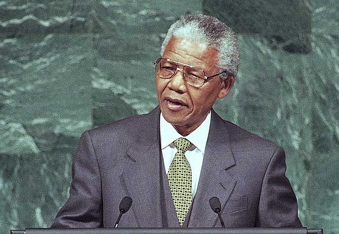 In this Oct. 3, 1994 file photo, South African President Nelson Mandela addresses the 49th United Nations General Assembly session, five months after being inaugurated at South Africa's first black president. South Africa's president Jacob Zuma says, Thursday, Dec. 5, 2013, that Mandela has died. He was 95.