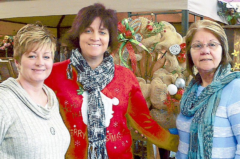 Robin Arnold, Kim Rimel and Pam Zimmerman were on hand to assist shoppers at Originals during the Christmas Open House, Saturday, Dec. 7.
