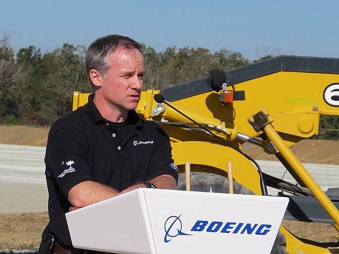 Charlie Hix, the director of Propulsion South Carolina for Boeing, speaks at the groundbreaking for the company's new propulsion plant that will make engine air intakes for the company's new 737 Max aircraft, in North Charleston, S.C., on Tuesday, Nov. 12, 2013. Boeing announced earlier this year that it would invest another $1 billion creating an additional 2,000 jobs in South Carolina during the next eight years, and the latest news is that Boeing will shift additional jobs to Alabama and Missouri too.