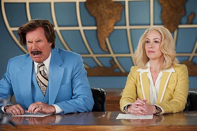 This photo provided by Paramount Pictures shows Will Ferrell, left, as Ron Burgundy and Christina Applegate as Veronica Corningstone, in a scene from the film, "Anchorman 2: The Legend Continues." Paramount Pictures releases the film in the US on Dec. 18, 2013.