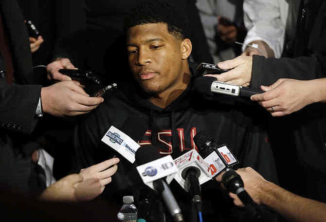 Heisman Trophy finalist Jameis Winston, a quarterback at Florida State, talks to reporters during an informal media availability, Friday, Dec. 13, 2013, in New York.