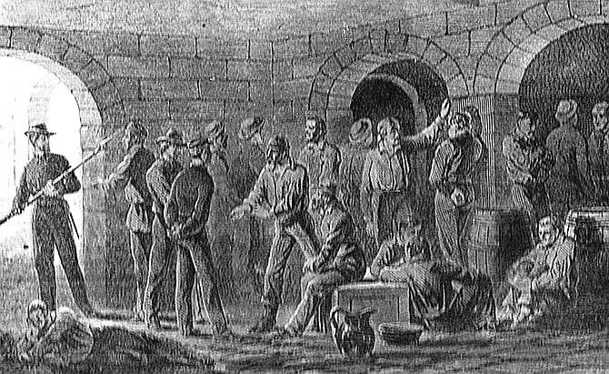Before Vogel Insurance owned and occupied the Democrat Building at 300 E. High St., its offices were at 301 W. High St., where the Harry S Truman State Office Building is today. In the basement of that razed historic building were shackles thought to have housed Civil War prisoners similar to those illustrated here in the Harper's Weekly sketch from Oct. 5, 1861.