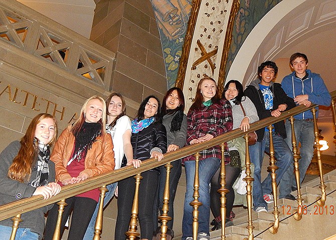 American Field Service (AFS) exchange students staying with Mid-Missouri host families visited the Capitol on Sunday. Pictured on the stairs, from left, are Emma Whittaker from Norway, Brie Henderson, Rachel Howard, Coni Gonzalez from Chile, Wisa Sawichako from Thailand, Olivia Howard, Ryoko Asakuma from Japan, Andres Ramirez from Chile, and Yoann Foti from Switzerland.