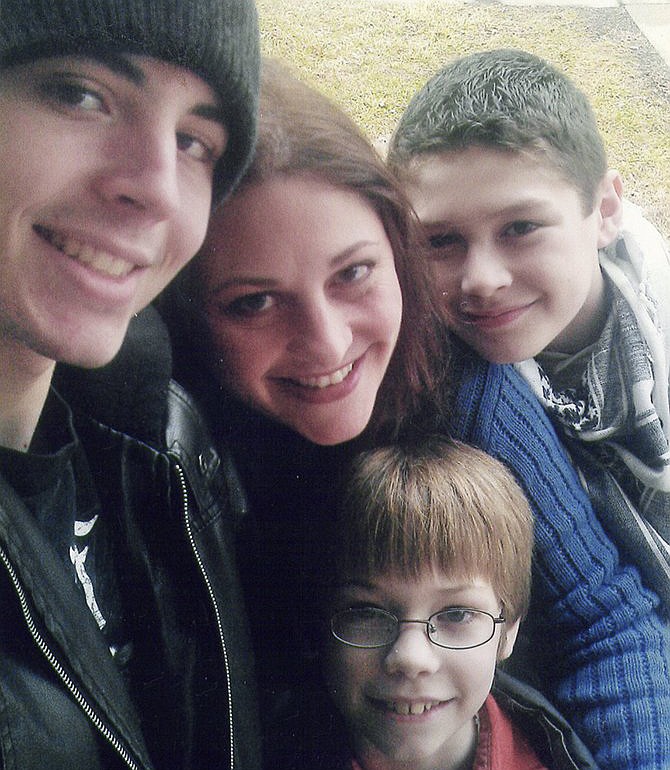 Pictured, from left, are Randy Chugg, mother Jennifer Riley; and brothers Zac, 13 and (below) Sammy, 12.