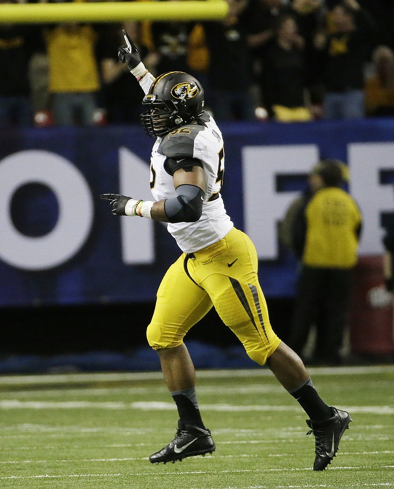 Missouri defensive end Michael Sam celebrates after making a play against Auburn in the SEC Championship title game earlier this month in Atlanta.