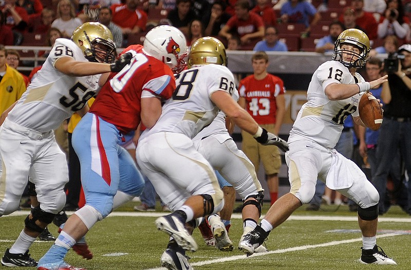 Helias quarterback Wyatt Porter prepares to make a throw during the Class 4 state championship game against Webb City last month at the Edward Jones Dome.