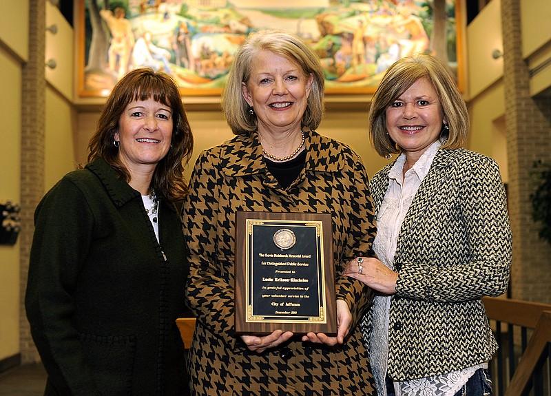 Lucia Erikson-Kincheloe, center, stands alongside Jefferson City director of human resources Gail Strope, left, and Cindy Meinhardt, right, after being presented the inaugural Kevin Meinhardt Memorial Award for Distinguished Public Service.
