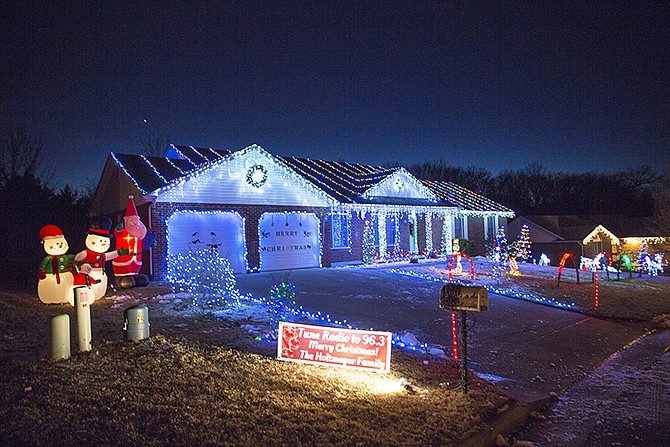 Travis & Ashley Holtmeyer, 3023 Mercedes Ln., have won the first ever People's Choice lights award in Jefferson City. The award was added to this year's holiday lights contest. 