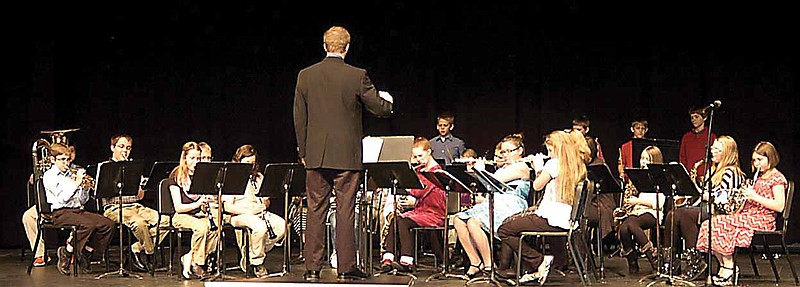 At the Middle School Concert on Tuesday, Dec. 17, the sixth grade band performs "Jingle Bells" directed by Dustijn Hollon.
