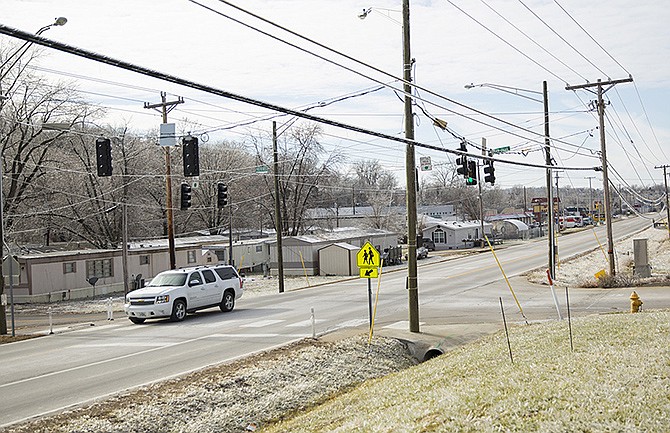 A car drives down Business 50 West in Cole County, which is targeted for reconstruction next year.