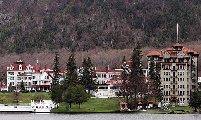 This May 10, 2012, file photo shows the Balsams Grand Resort Hotel in Dixville Notch, N.H. The hotel is the site of the first voters every four years for the nation's earliest presidential primary. Two years ago the hotel was sold, but the doors still remain shut with no guests and its future is uncertain.