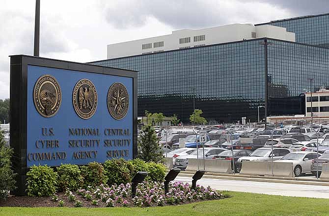 This June 6, 2013 file photo shows a sign outside the National Security Agency (NSA) campus in Fort Meade, Md. A civil rights lawyer says the American Civil Liberties Union (ACLU) is very disappointed that a New York judge has found that a government program that collects millions of Americans' telephone records is legal. 