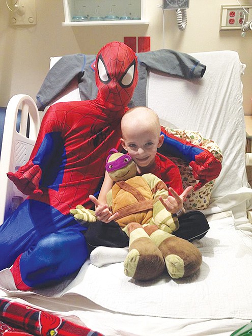 Spiderman visited Sam Santhuff, 5 of Fulton, during a stay at Children's Hospital in St. Louis. Through his battle with cancer, Sam has received the nickname "Super Sam." Before the nickname, though, he was a big fan of superheroes, but especially the Teenage Mutant Ninja Turtles. A benefit for Sam Santhuff will be on Jan. 4 at St. Peter Catholic Church in Fulton.